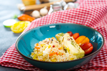 Andalusian fish, saffron rice with vegetables
