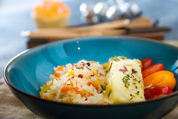 Andalusian fish, saffron rice with vegetables