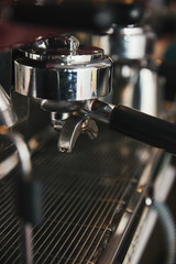 Fototapeta na wymiar close-up view of professional coffee maker in coffeehouse