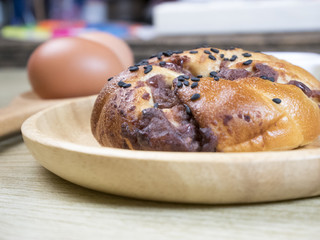 hot cross buns with raisins and nuts on white background