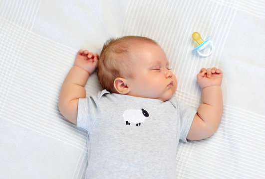 Portrait of a sleeping 3 month old baby