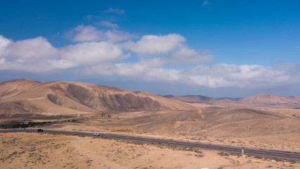 Fototapeta na wymiar aerial view of road and volcanic mountain