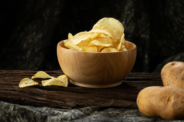 potato chip crispy in wood bowl on wood background  unhealthy cause of fat but delicious  snack