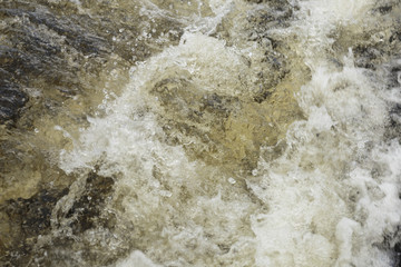 Churning water, abstract background.