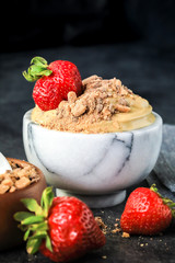 Creamy Chocolate English Toffee Fruit Dip on dark background