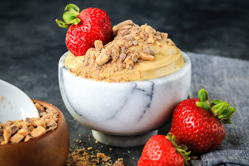 Creamy Chocolate English Toffee Fruit Dip on dark background