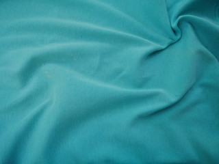 green texture of silk fabric background