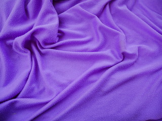 smooth elegant purple silk fabric background.sportswear cloth