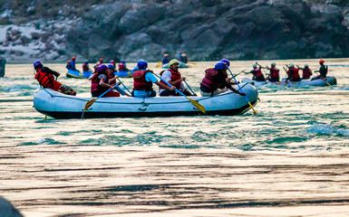 Rafting in Rishikesh  on the Ganges river during sunset