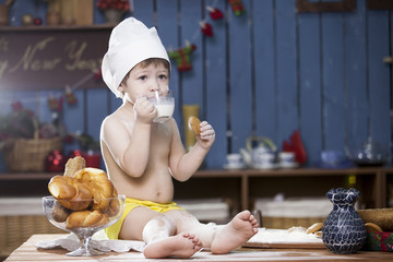 cook a little boy drinking milk