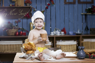 cook a little boy drinking milk