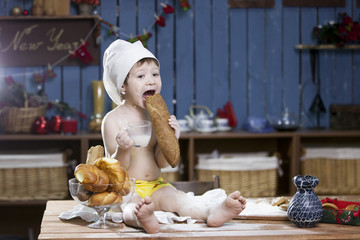 cook a little boy drinking milk