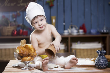 cook a little boy drinking milk