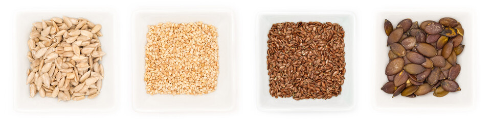 Verschiedene Samen in Schalen als Sammlung