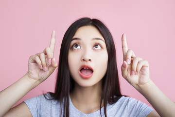 In perplexity the girl shows her fingers in her head with something that surprised her...
