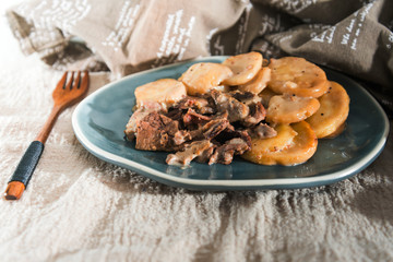 juicy steak veal beef meat with tomato and potatoes