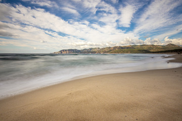 Fototapeta na wymiar Porto Paglia beach a mistral day, on west coast of Sardinia, Iglesias