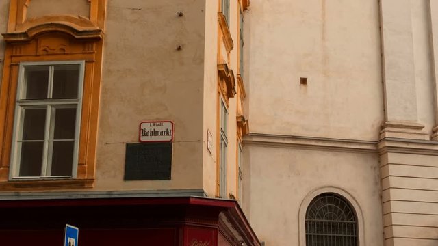 Panoramic shot of the Michaelerplatz square in Vienna, featuring the house of music composer Joseph Haydn and the Hofburg Palace