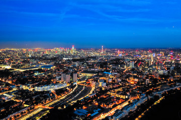 Fototapeta na wymiar Aerial view night cityscape of London with urban architectures. Icons of the London skyline feat. residential areas such as Euston, Fitzrovia, Marylebone with Central Famous Buildings in England, UK