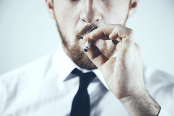 Cigarette in the hands of a  businessman