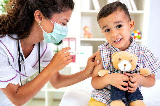 Child receiving a vaccine dose