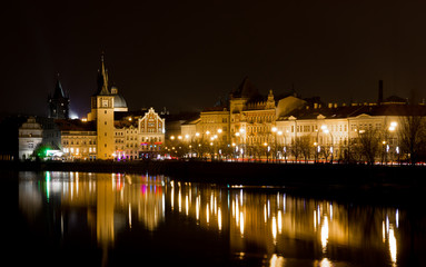Fototapeta na wymiar 10 December 2017. Prague, Czech. Night Prague city with river and buildings lighted