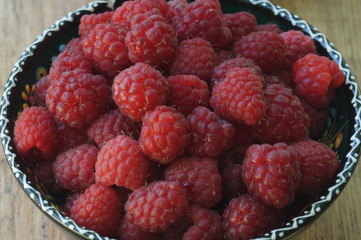 Large, juicy raspberries and blackberries