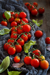 Fototapeta na wymiar Cherry tomatoes and basil