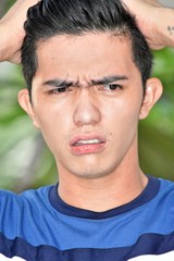 Fototapeta premium Confused Handsome Minority Male Person