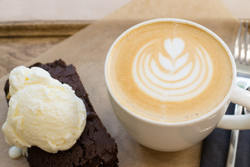 Brownie with ice creem and cappuccino