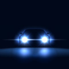 Night car with bright headlights approaching in the dark, silhouette of car with xenon headlights in the showroom, vector illustration © valerybrozhinsky