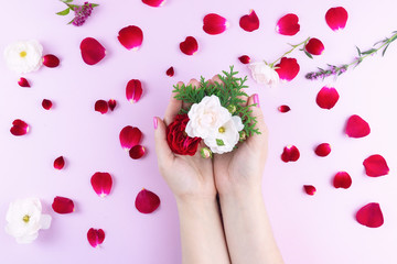 Obraz na płótnie Canvas beauty hands with makeup flowers