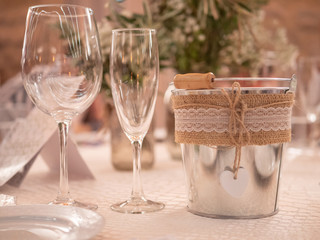 Two glasses and romantic cube in wedding celebration