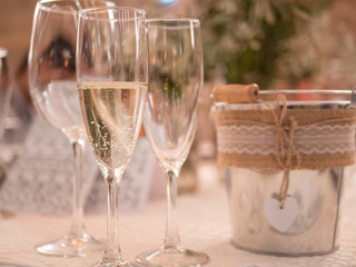 Three glasses with romantic cube in wedding celebration