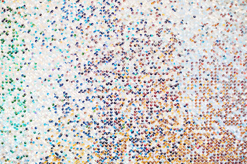 Colorful art deco style sequins holiday texture background