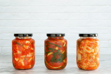 Variety homemade kimchi in a glass jars