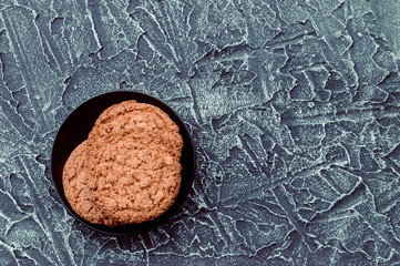oatmeal cookies on a dark background 