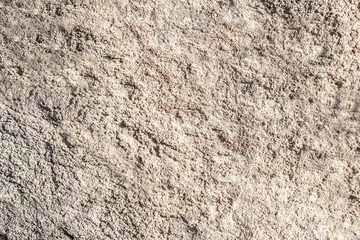 Background of a beige stone wall