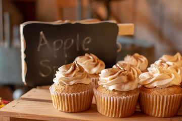 Apple spice cupcakes for a fall wedding. Cupcakes are decorated with a swirled buttercream frosting...