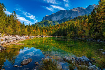 Naklejka na ściany i meble A beautiful view at the colourful Frillensee in Germany, near Zugspitze, Alps, October 2018