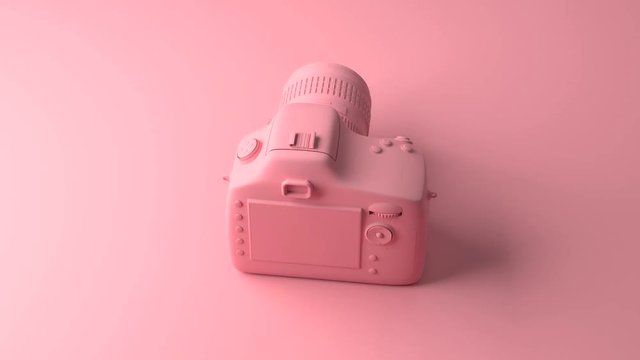 Cool professional camera revolves around its axis. All painted in one fashionable pink and pastel color. Illustration in Minimal style
