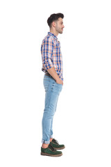relaxed casual man wearing plaid shirt waiting in line