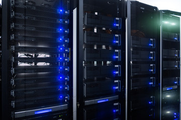 Server room interior in datacenter in blue light