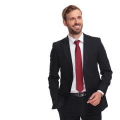 handsome relaxed businessman looks to side