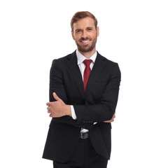 portrait of confident businessman smiling and standing