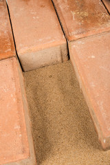 The beach beneath the pavement
