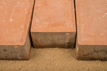 The beach beneath the pavement