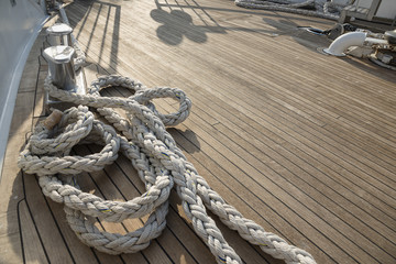 Yacht's bow covered with teak wood background. 