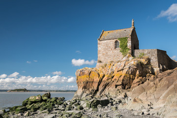 Small chapel on the side of Le Mont Saint Michelle on a sunny day in summer