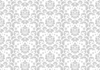 Wallpaper in the style of Baroque. Seamless vector background. White and grey floral ornament. Graphic pattern for fabric, wallpaper, packaging. Ornate Damask flower ornament.